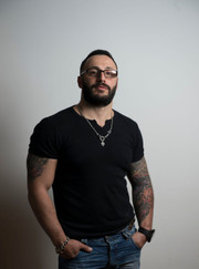 Тату-мастер Эд Грек