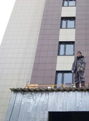 Промышленный альпинист, отделочник Дмитрий Михайлович Старовойтов